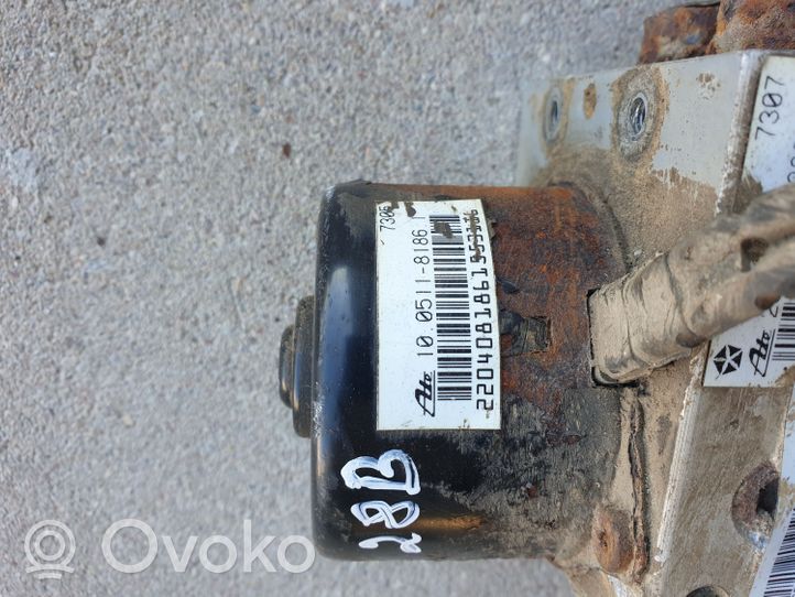 Dodge Grand Caravan ABS Blokas 25094601033