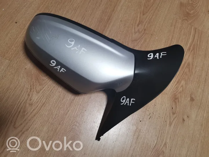 Opel Astra H Front door electric wing mirror 010795