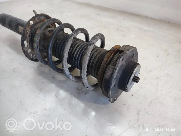 Volkswagen PASSAT B7 Front shock absorber with coil spring 3C0413031AT