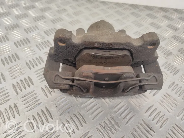 Volkswagen Jetta VI Caliper de freno delantero 