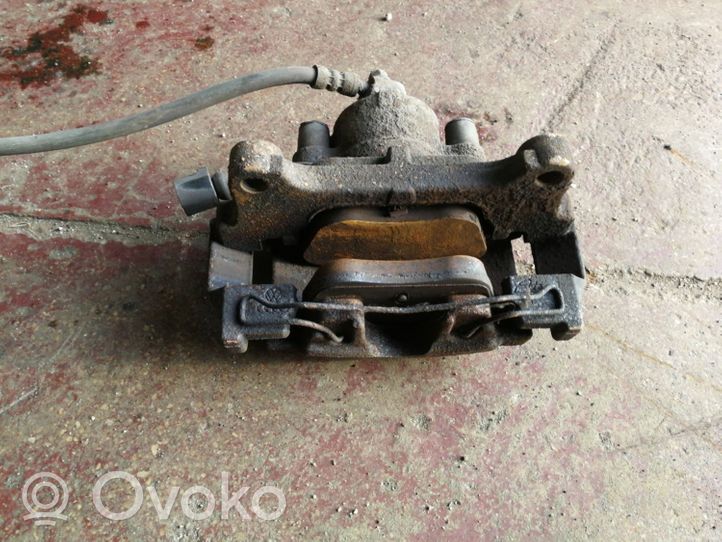 Volkswagen Tiguan Front brake caliper 