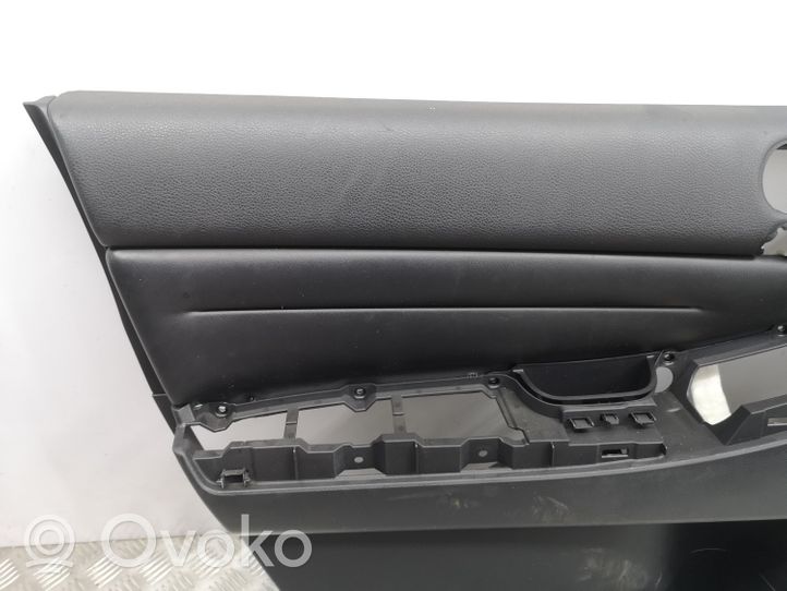 Mazda CX-7 Garniture de panneau carte de porte avant EH8368450D02