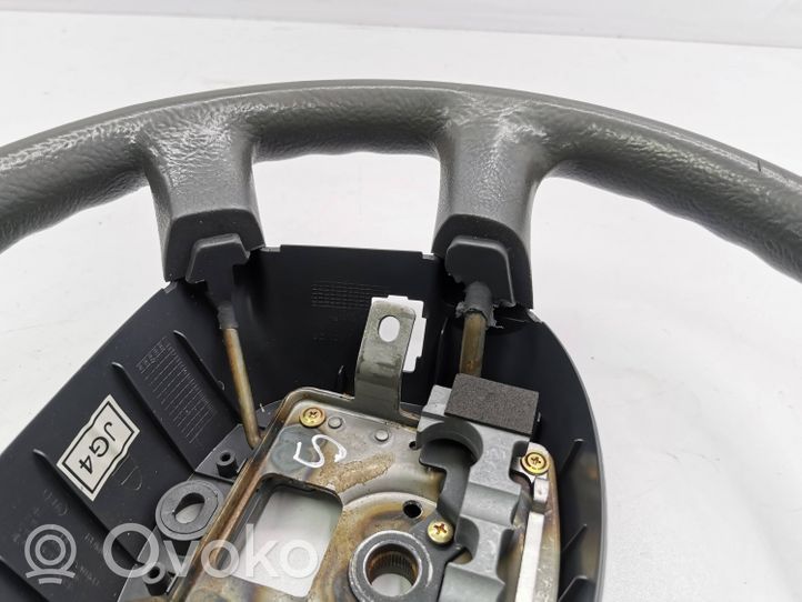 KIA Carens I Steering wheel 0K2FB32980