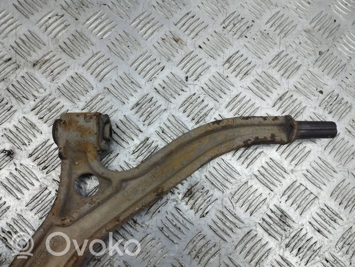 Chrysler Voyager Front lower control arm/wishbone 04694973AA