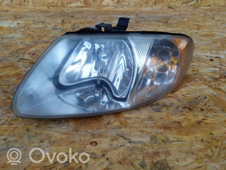 Dodge Caravan Lampa przednia 04857701ab