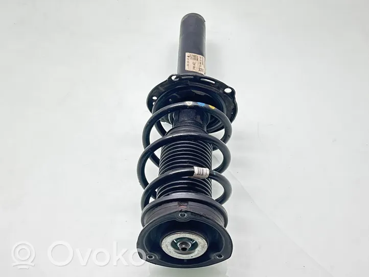 Volkswagen PASSAT B8 Front shock absorber with coil spring 3Q0413031BP