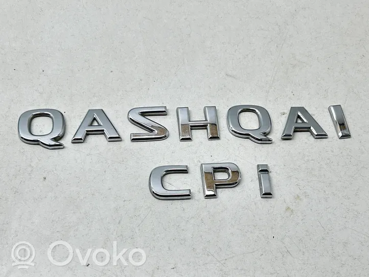 Nissan Qashqai Emblemat / Znaczek tylny / Litery modelu 90892JD000