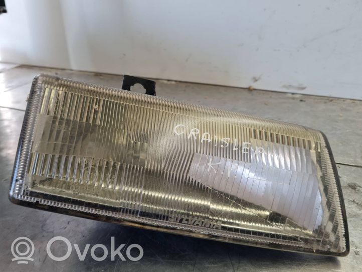 Chrysler Voyager Lampa przednia E13175022596