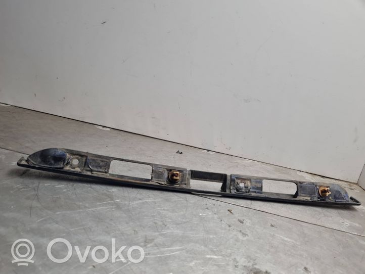 Volkswagen Golf III Trunk door license plate light bar 1H6827577