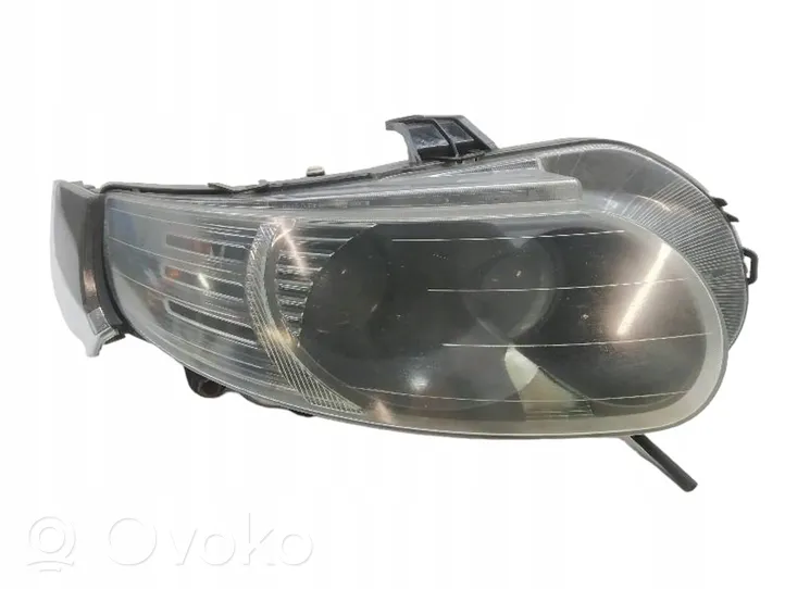 Saab 9-5 Lampa przednia 