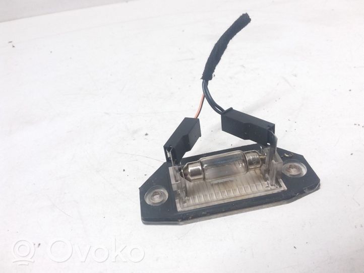 Ford Mondeo Mk III Lampa oświetlenia tylnej tablicy rejestracyjnej 1S7113550AC