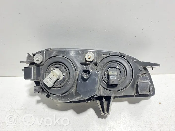 Toyota Corolla E100 Lampa przednia 10077126