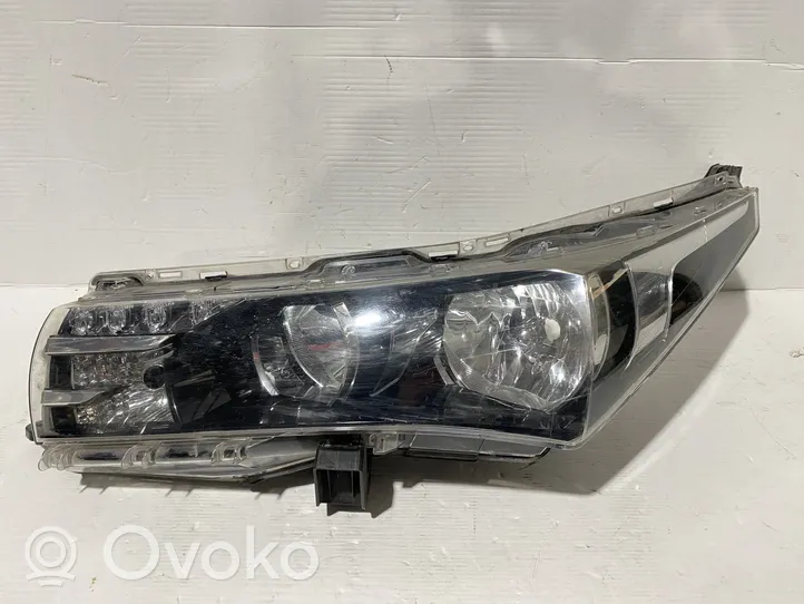 Toyota Corolla E160 E170 Передняя фара 8115002E70