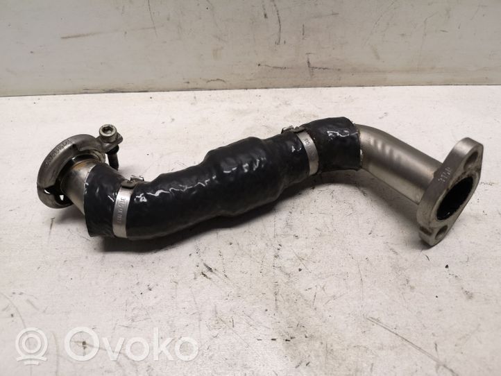 Volkswagen Polo V 6R Support, tuyau de refroidissement intermédiaire 04B131521G