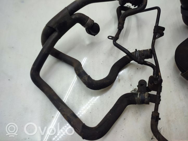 Volkswagen Touran II Engine coolant pipe/hose 1K0121049