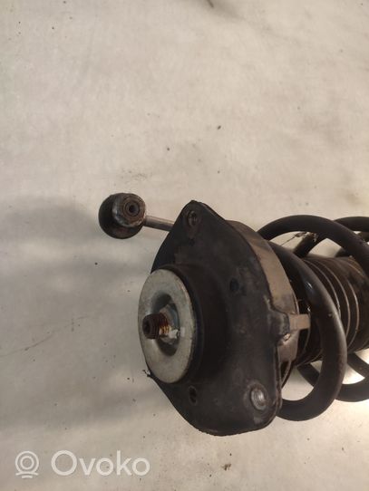 Volkswagen Jetta V Front shock absorber with coil spring 1T0413031G