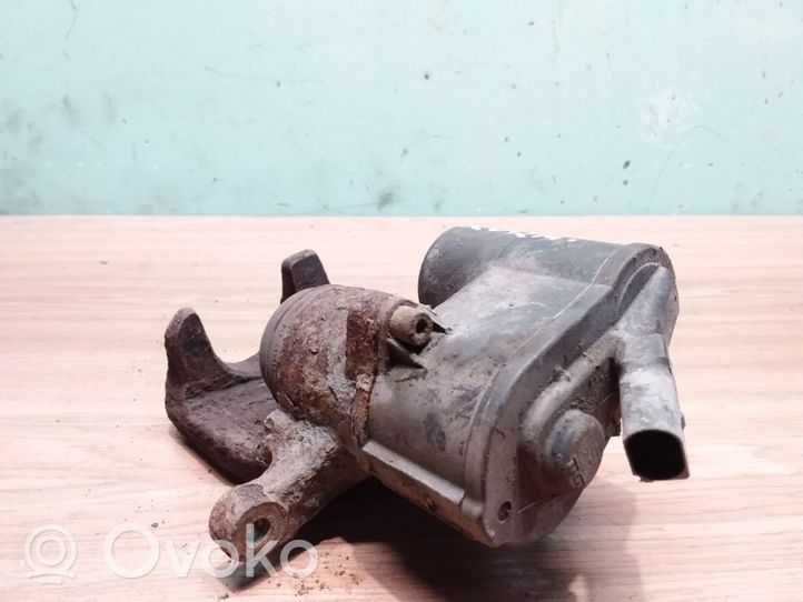 Volkswagen PASSAT B7 Caliper del freno trasero 