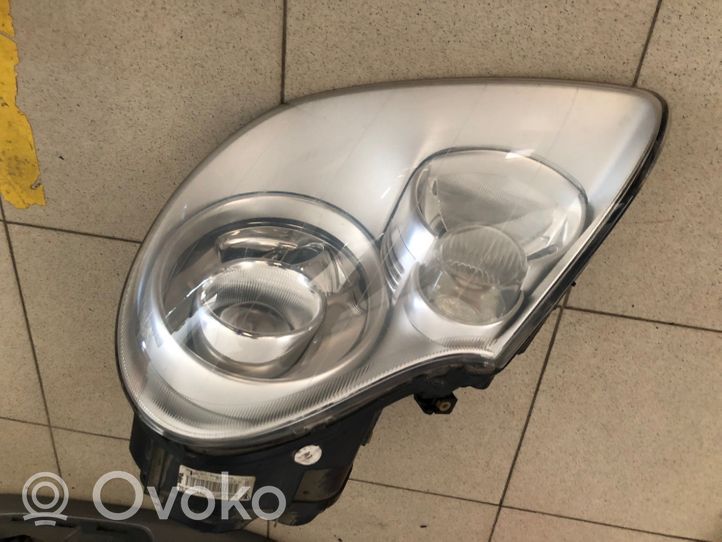 Porsche Cayenne (9PA) Lampa przednia 7L5941005AR