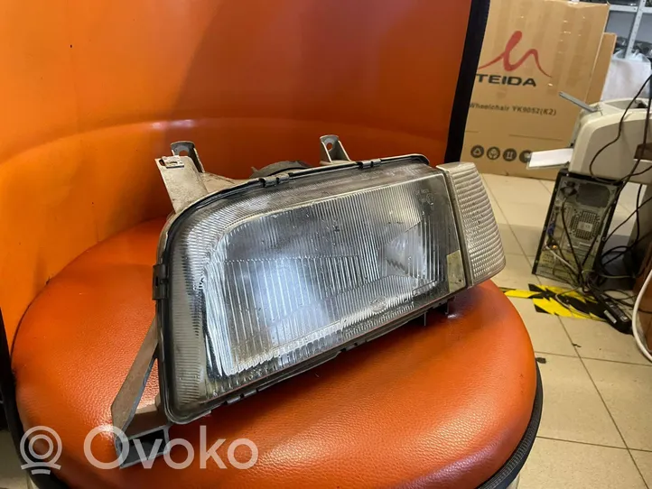 Volvo 460 Lampa przednia 301143179