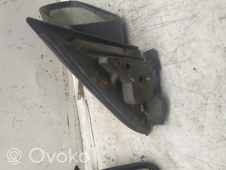 Opel Omega B1 Front door electric wing mirror E1010357