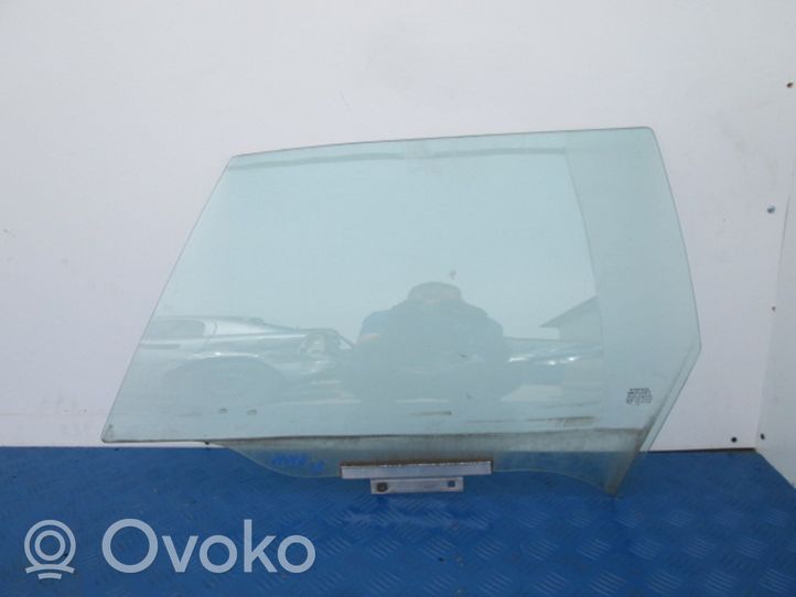 Volvo 480 Front door window glass four-door 