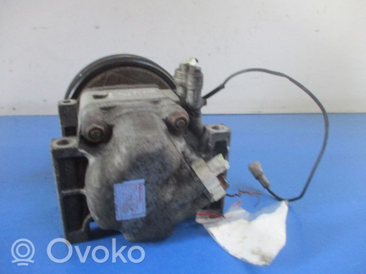 Mazda 323 Ilmastointilaitteen kompressorin pumppu (A/C) H12A1AA4DL