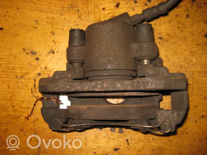 Mazda 121 SM Caliper de freno delantero 