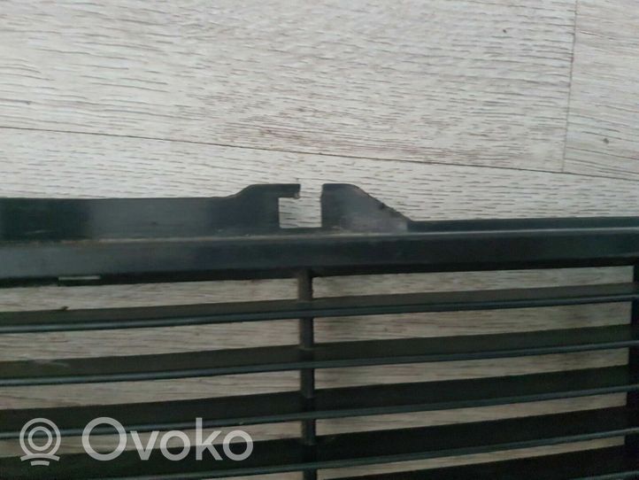 Volkswagen Golf I Front bumper upper radiator grill 171853653D