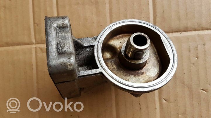 Volkswagen Golf II Supporto di montaggio del filtro dell’olio 055115417A