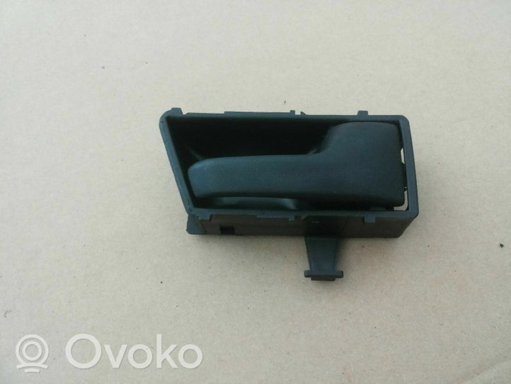 Volkswagen Golf II Front door interior handle 321837236A