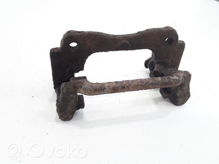 Toyota Avensis T250 Supporto della pinza del freno posteriore 0204Y01338