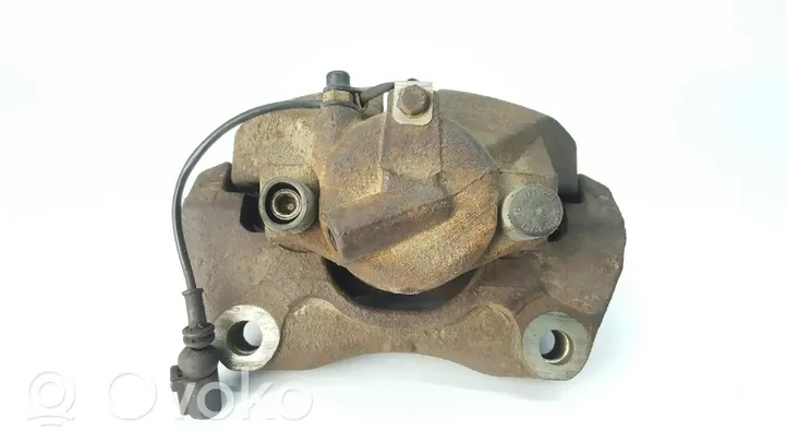 Volkswagen Touareg I Caliper de freno delantero 767E238