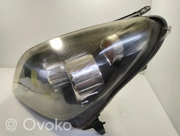 Opel Astra H Lampa przednia 1EG27037001