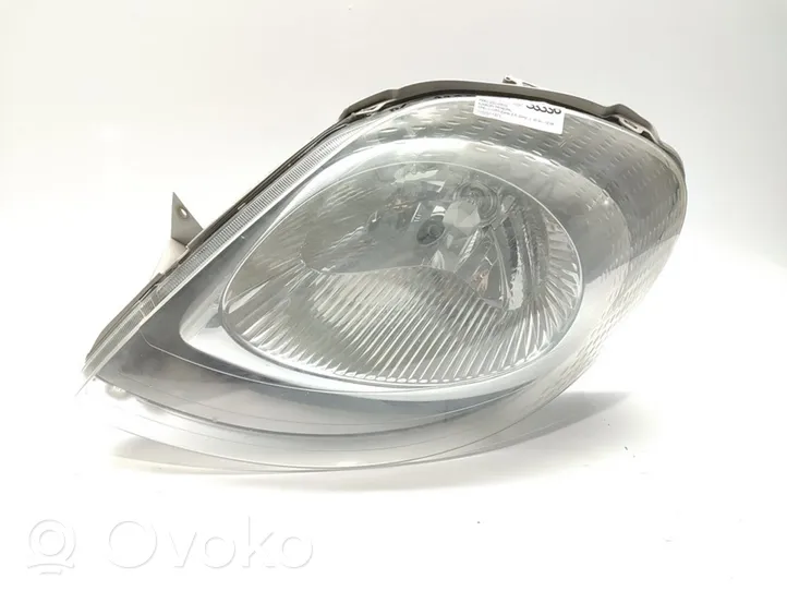 Opel Vivaro Lampa przednia 7700311371