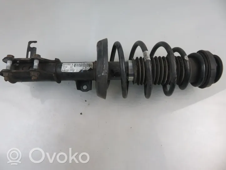 Opel Astra J Front shock absorber with coil spring 