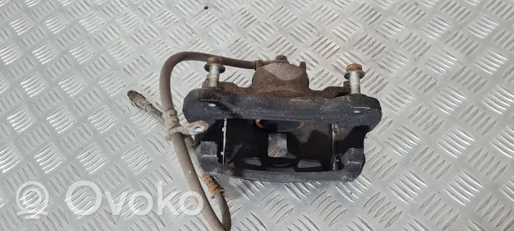 Mitsubishi L200 Caliper de freno delantero 