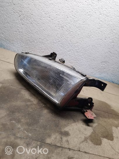 Hyundai Lantra I Lampa przednia 1012492