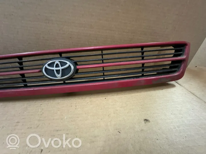 Toyota Carina T190 Grille calandre supérieure de pare-chocs avant 5310105010