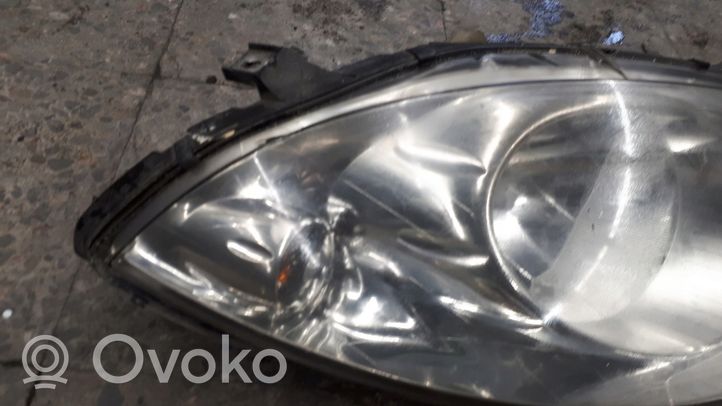 Mercedes-Benz A W169 Lampa przednia 0301197202