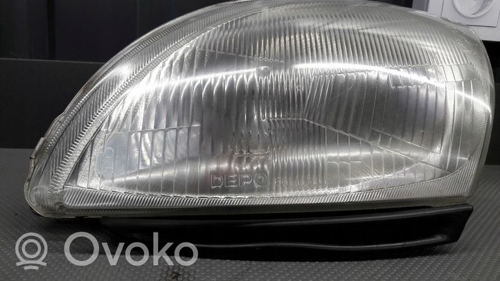 Fiat Seicento/600 Lampa przednia 6611131L