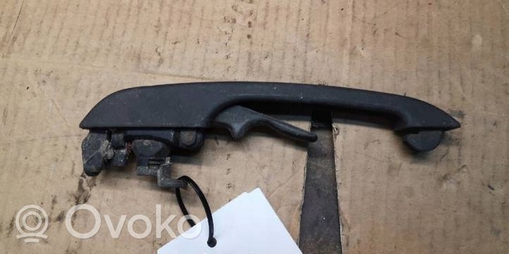 Volkswagen Polo I 86 Front door exterior handle 863837205