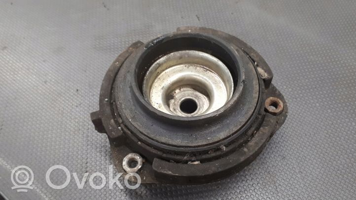 Volkswagen PASSAT B6 Front coil spring rubber mount 1k0412331c