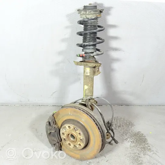 Volkswagen Tiguan Front shock absorber with coil spring 