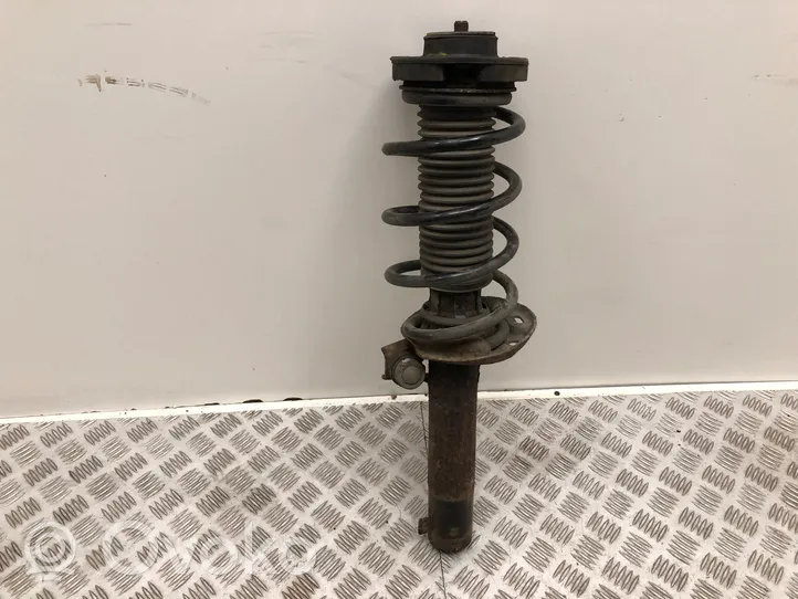 Volkswagen Golf VI Front shock absorber with coil spring 