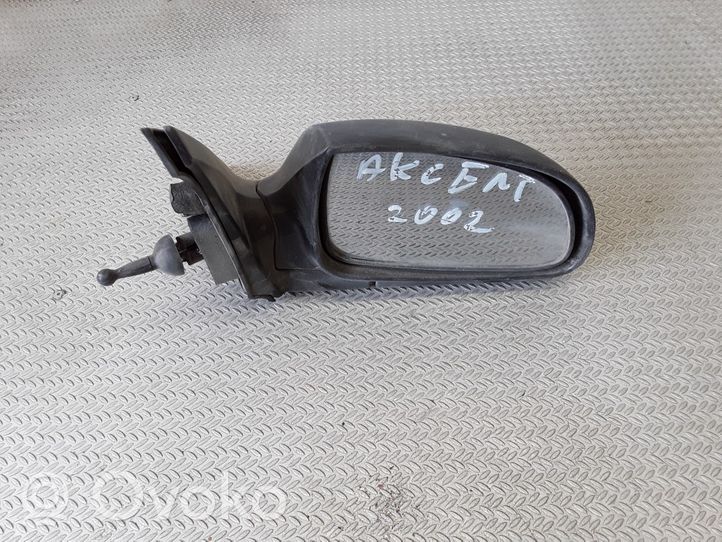 Hyundai Accent Manualne lusterko boczne drzwi przednich E4012129