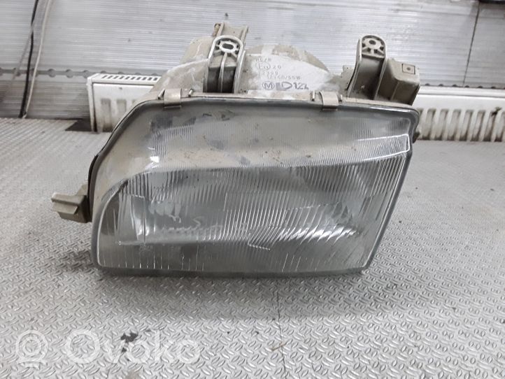 Daihatsu Charade Lampa przednia E1320022399