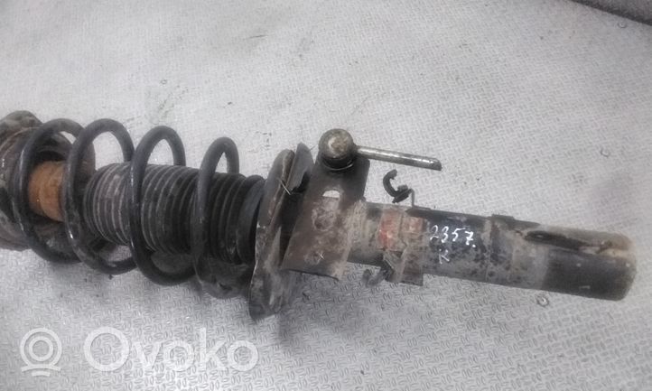 Volkswagen Polo Front shock absorber with coil spring 