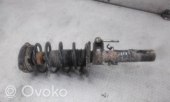 Volkswagen Polo Front shock absorber with coil spring 