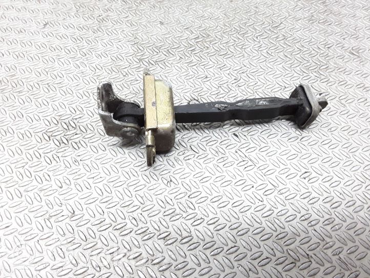 Nissan Primera Türfangband Türfeststeller Türstopper vorne 