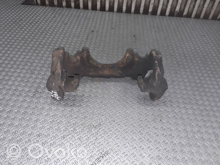 Volkswagen Golf V Plaquette / support d'étrier avant 